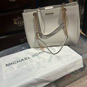 Michael Kors White optical Saffiano purse.